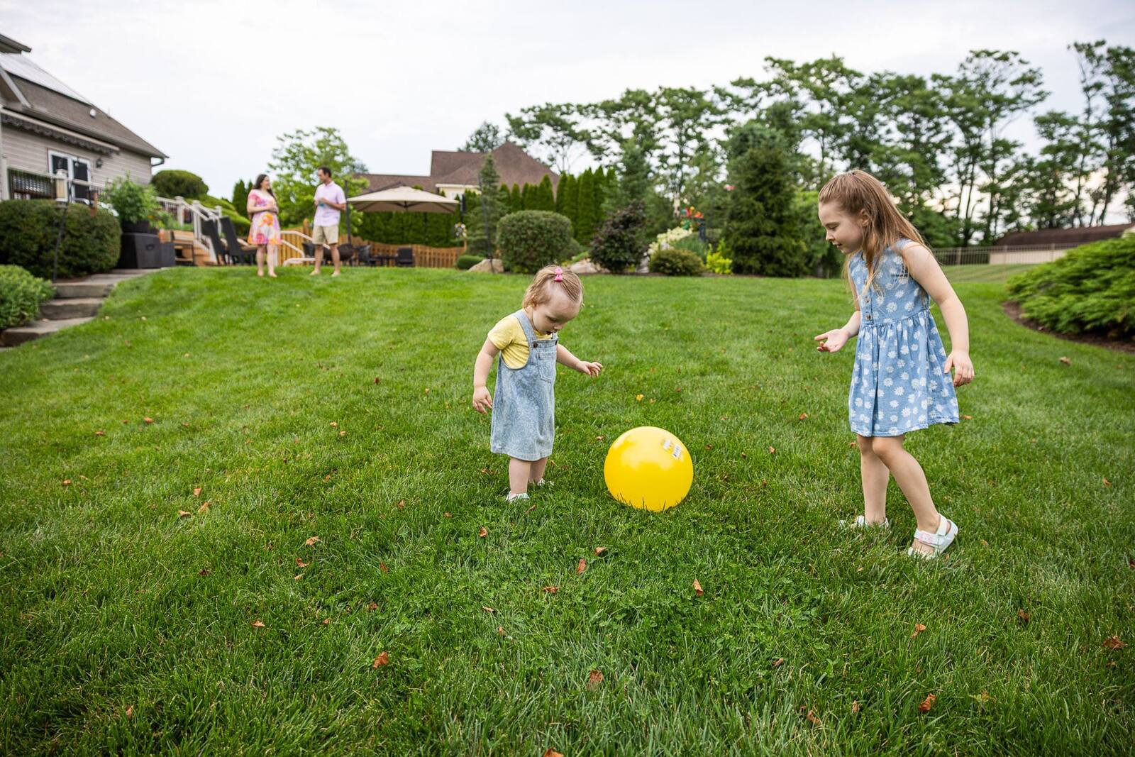 Kids playing in healthy green grass