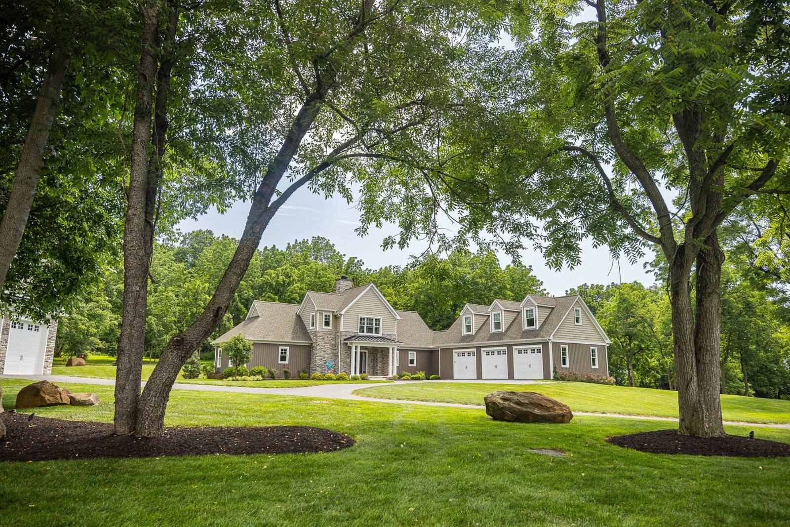 nice green grass lawn trees shade home mulch
