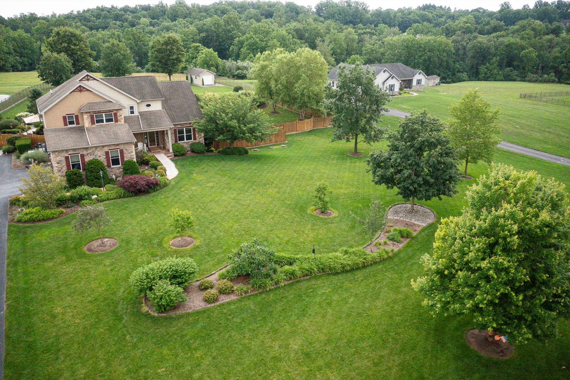 Central PA neighborhood with mixed lawn and woodland — typical tick habitat range