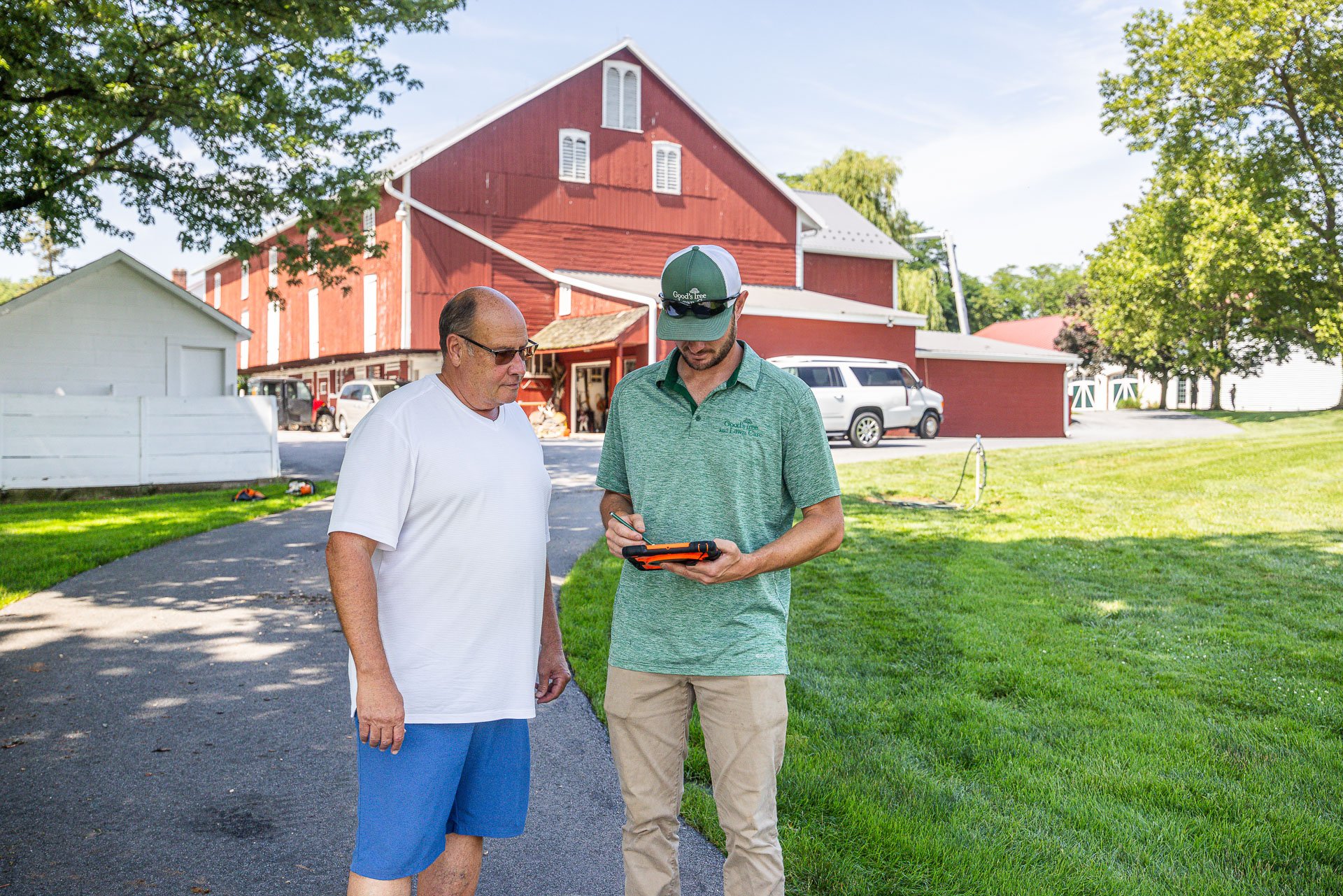arborist reviewing local regulations with customer