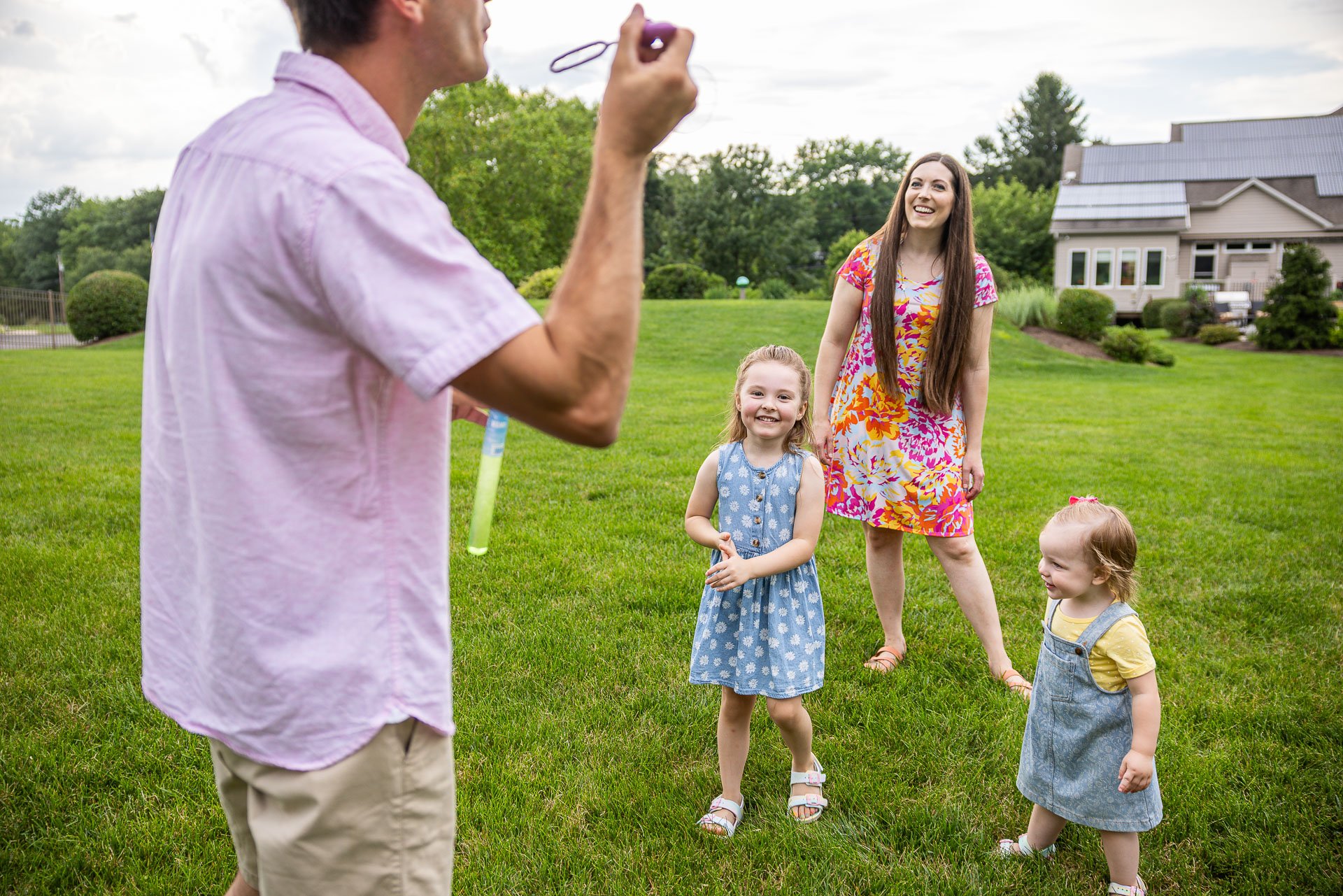 family playing kids grass client happy bubbles lawn 5