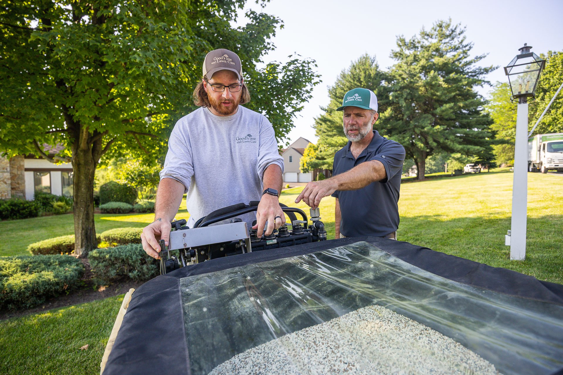 lawn care technician receiving training on equipment