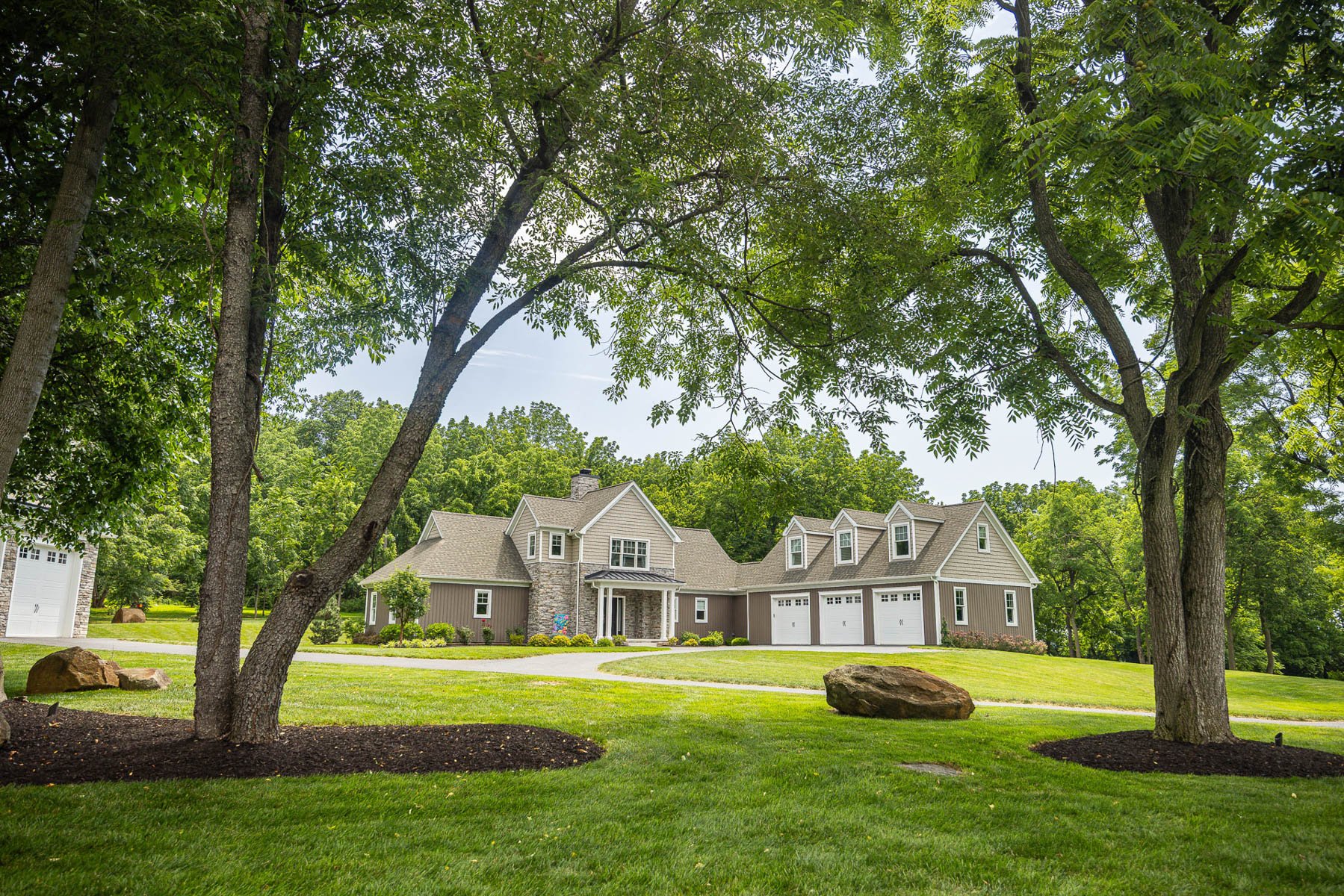 nice green grass lawn trees shade home mulch